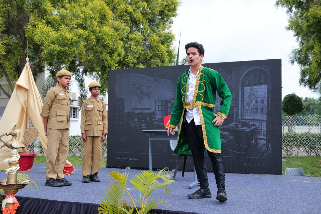 Student drama performance on an outdoor stage at TACS