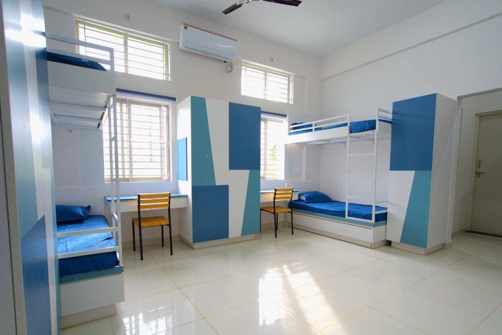 Modern hostel rooms at TACS